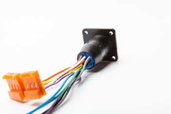 Create customized hermetic connector assemblies with plastic connectors and integral wires or cables