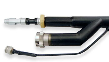 Water-tight sealed fiber optic cable assembly