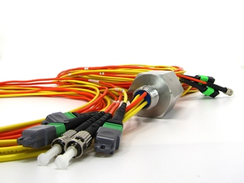 Hermetic fiber optic NPT feedthrough with SM and MM fiber in the same mechanical interface.